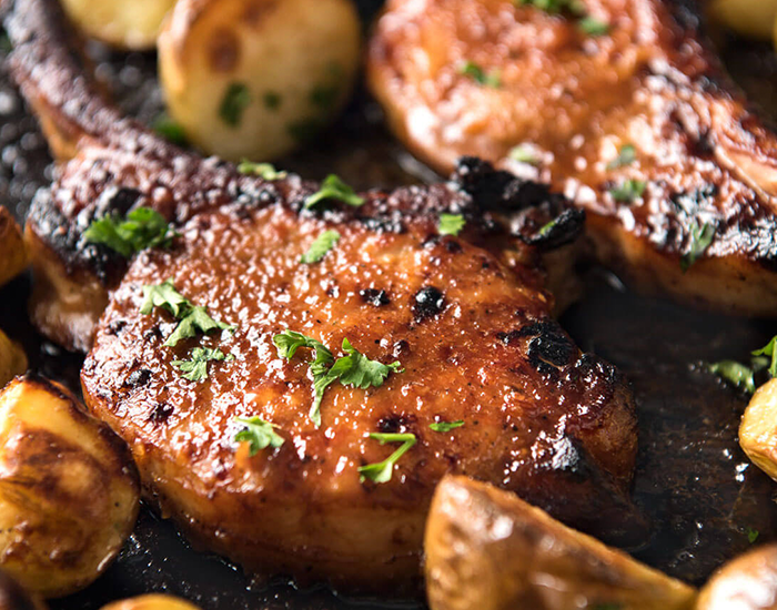 Bone-in dry aged Duroc pork rib eye chop, 14 oz