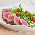 Seared ahi tuna, pre-sliced and fanned out