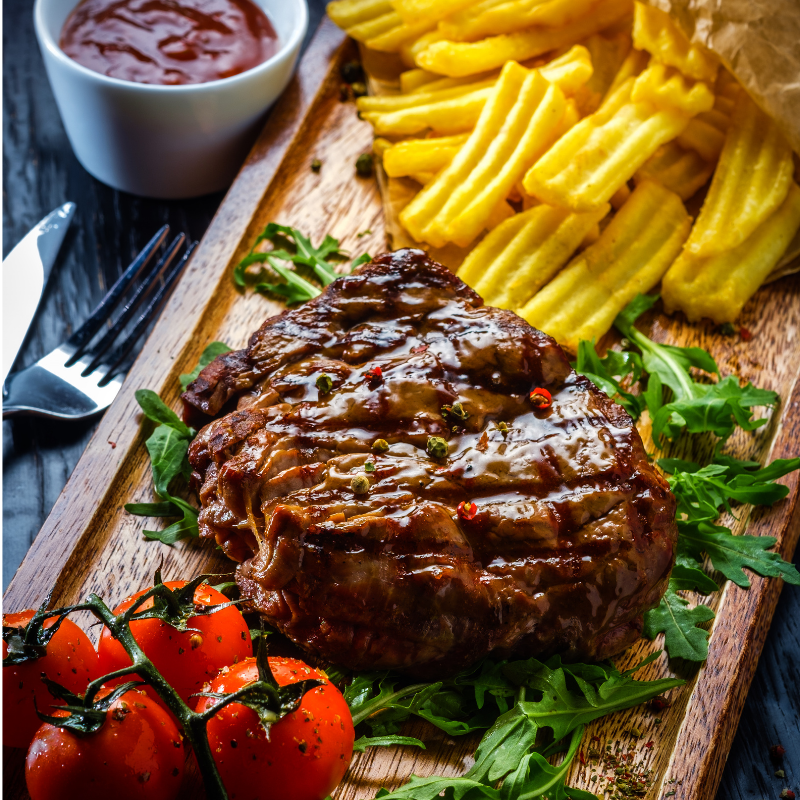 Raw rib eye filet steaks cut from the heart of the ribeye